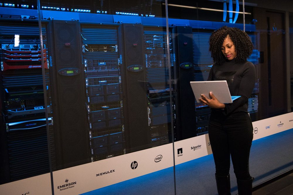 Blue-lit data center with server racks